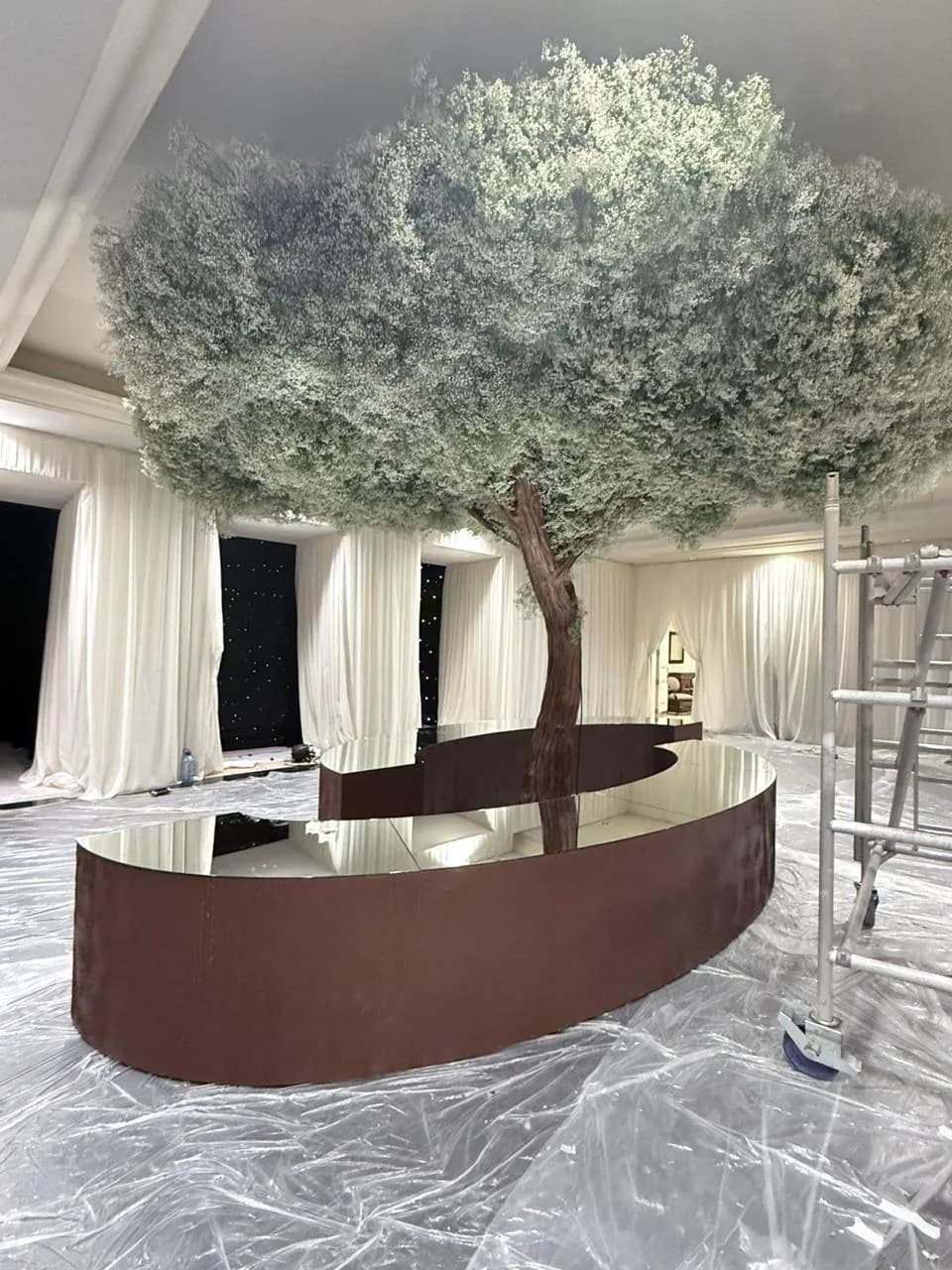Oversized floral tree installations for a luxury wedding reception