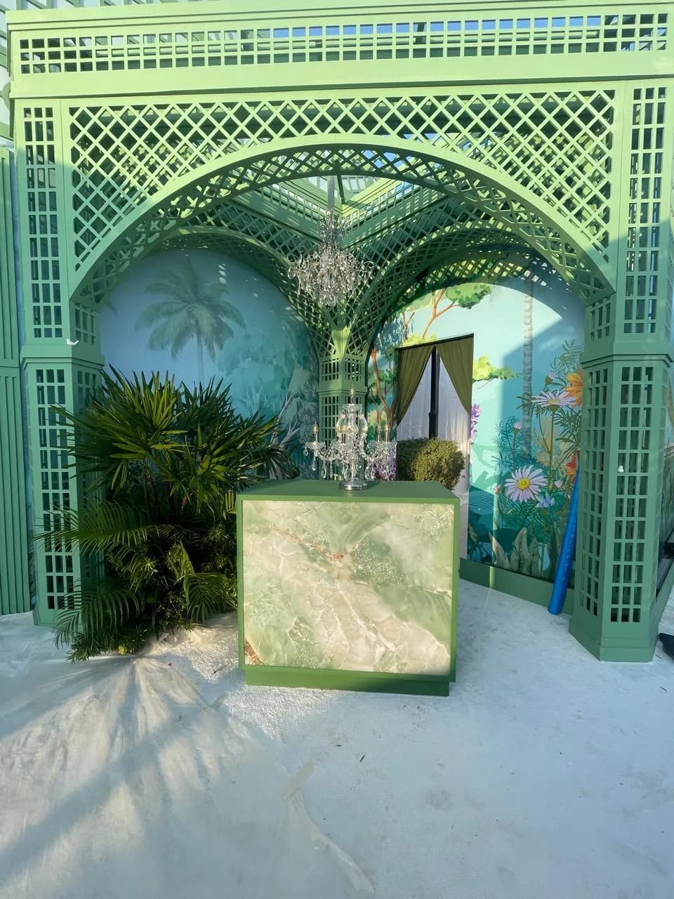 Bespoke garden trellis and floral courtyard build for an outdoor luxury wedding
